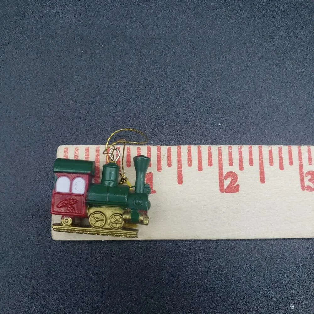 Lot of‎ 6 train Christmas ornaments including Wallace Silversmiths Enamel train